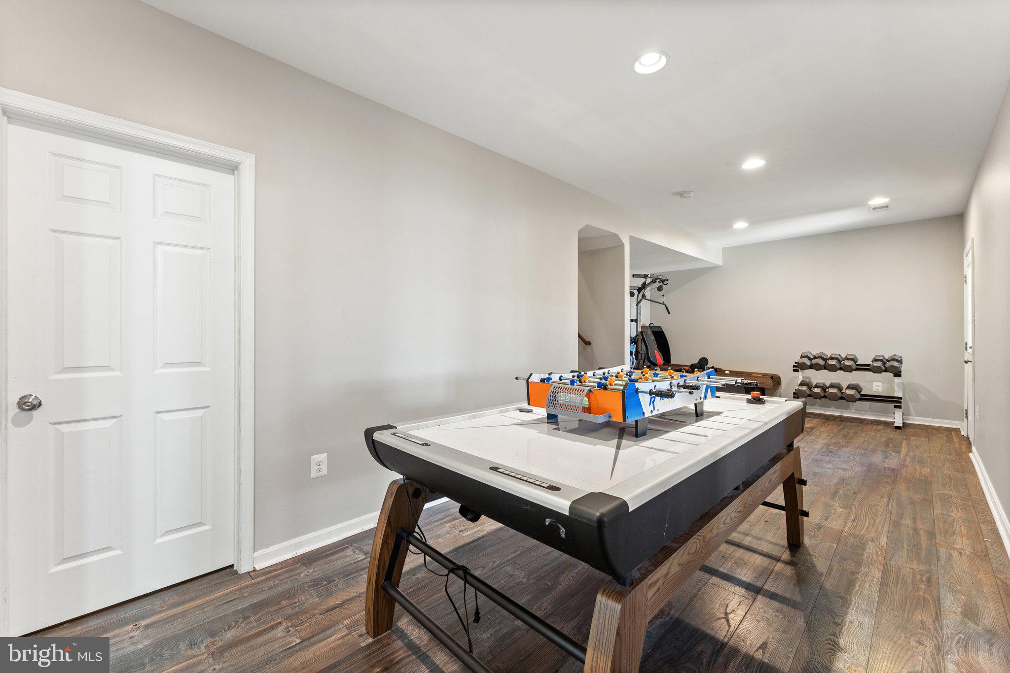 11652 Alum Springs Road Rixeyville, VA 22737 - Photo 42 of 64 a view of a dining room with furniture and wooden floor