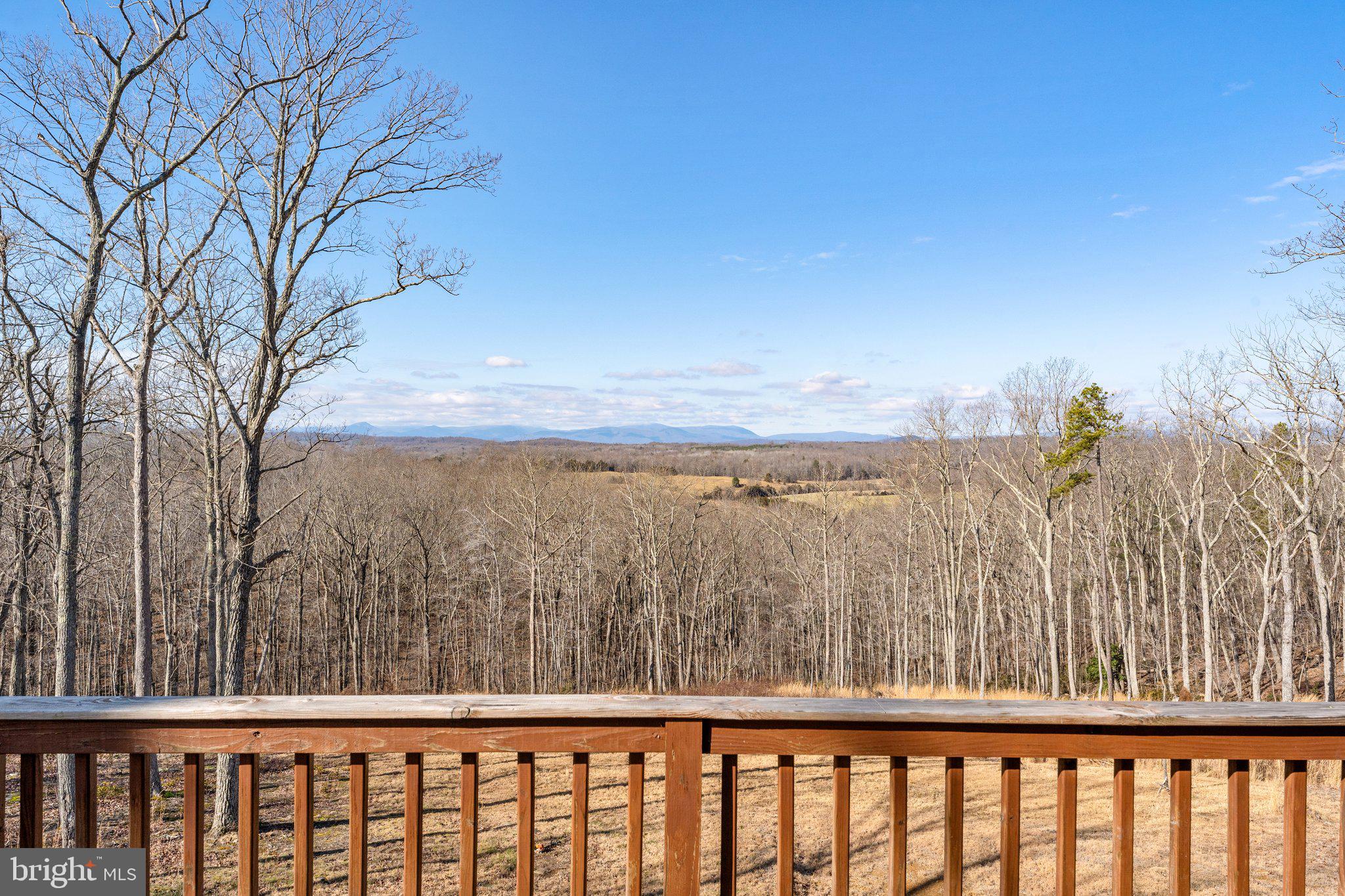 11652 Alum Springs Road Rixeyville, VA 22737 - Photo 56 of 64 a view of a balcony next to a yard