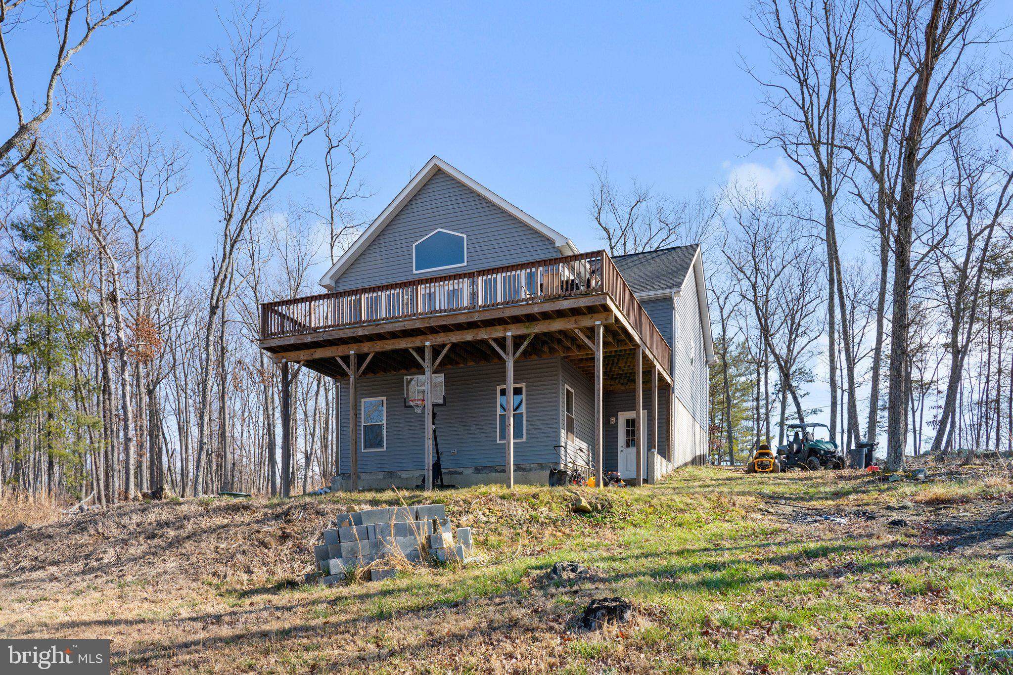 11652 Alum Springs Road Rixeyville, VA 22737 - Photo 59 of 64 a front view of a house with a yard