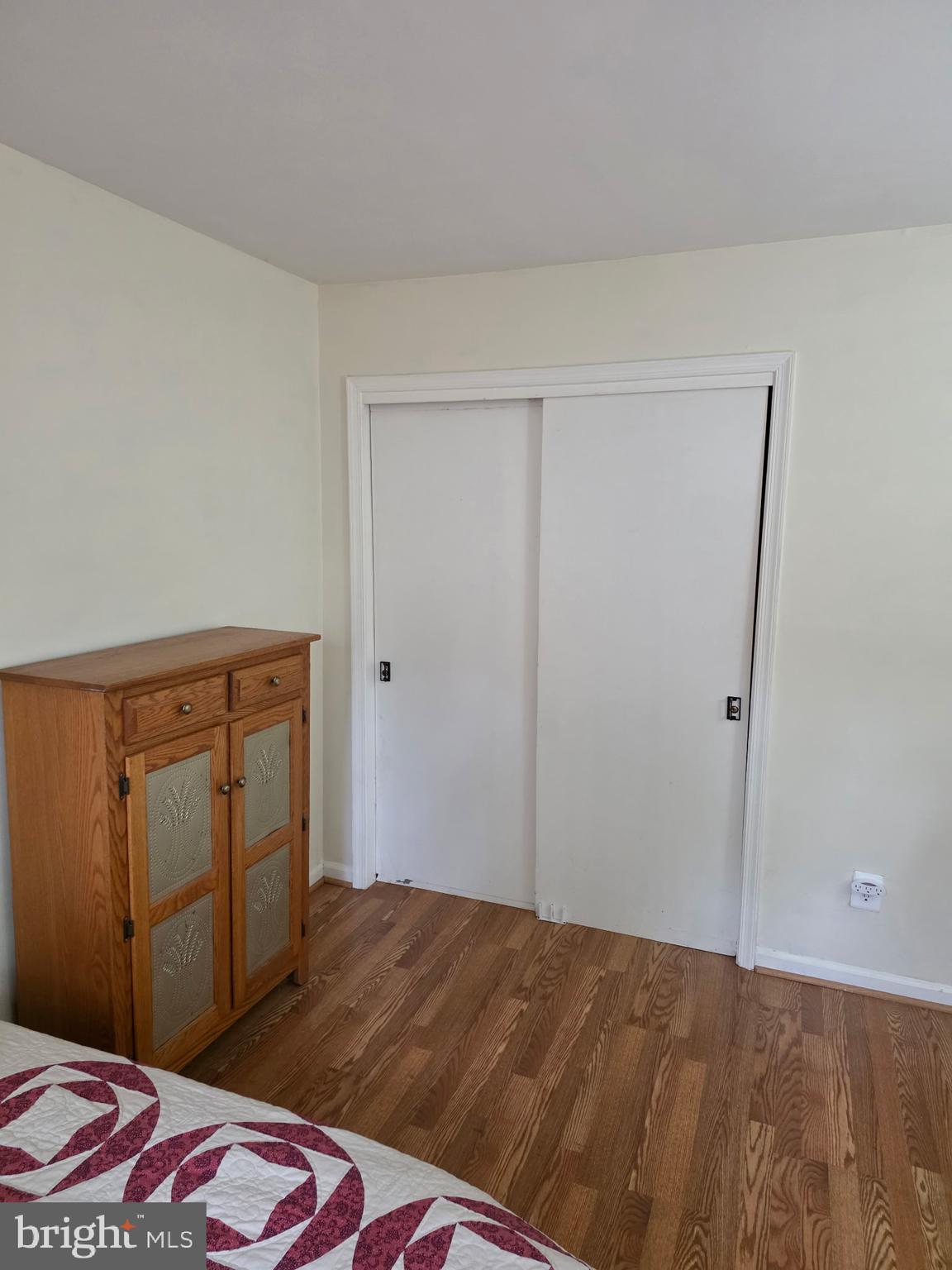 5913 Prince James Drive, Unit J Springfield, VA 22152 - Photo 14 of 33 a bedroom with a bed and a dresser