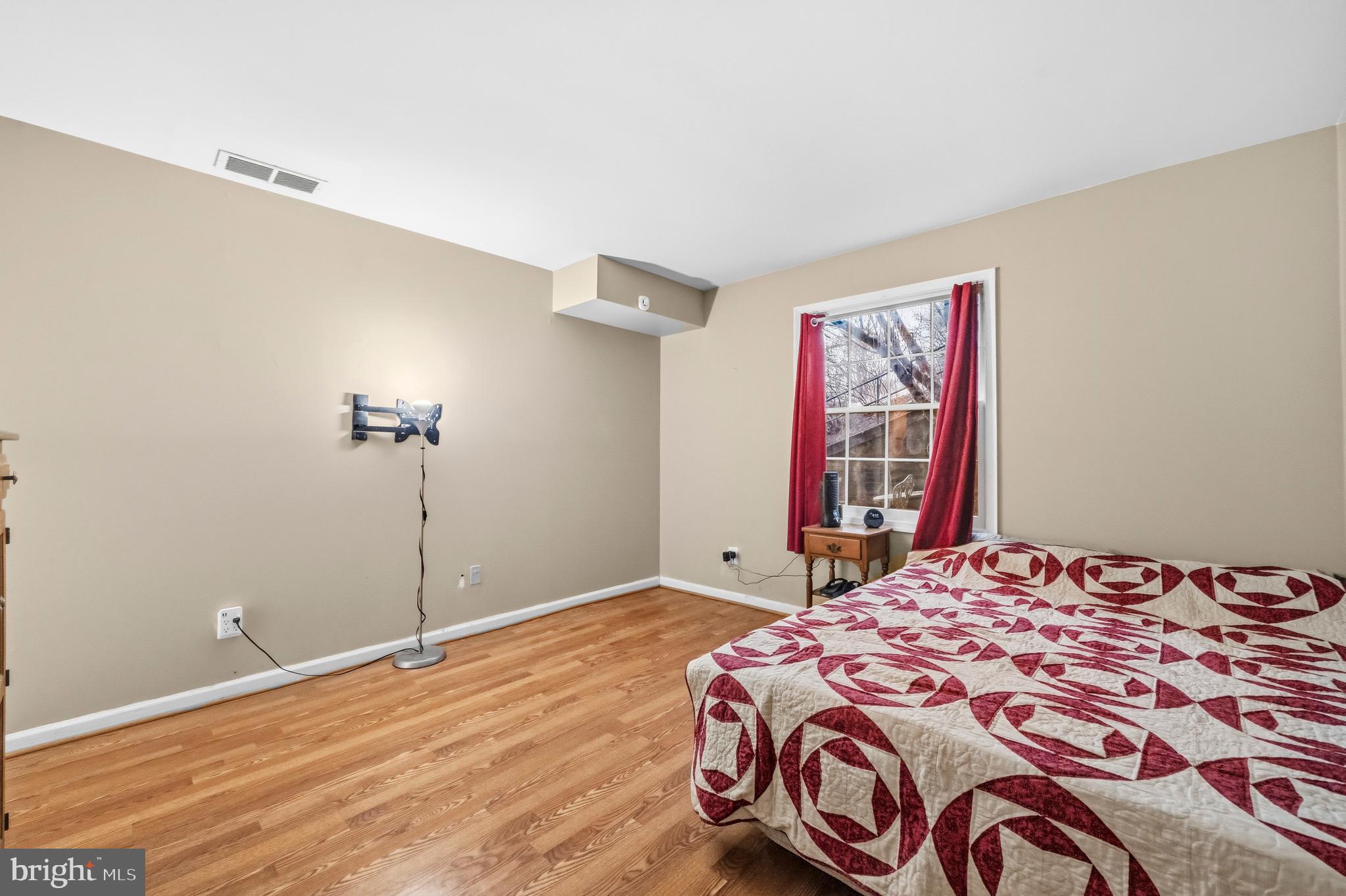5913 Prince James Drive, Unit J Springfield, VA 22152 - Photo 15 of 33 a bedroom with a bed and a walk in closet