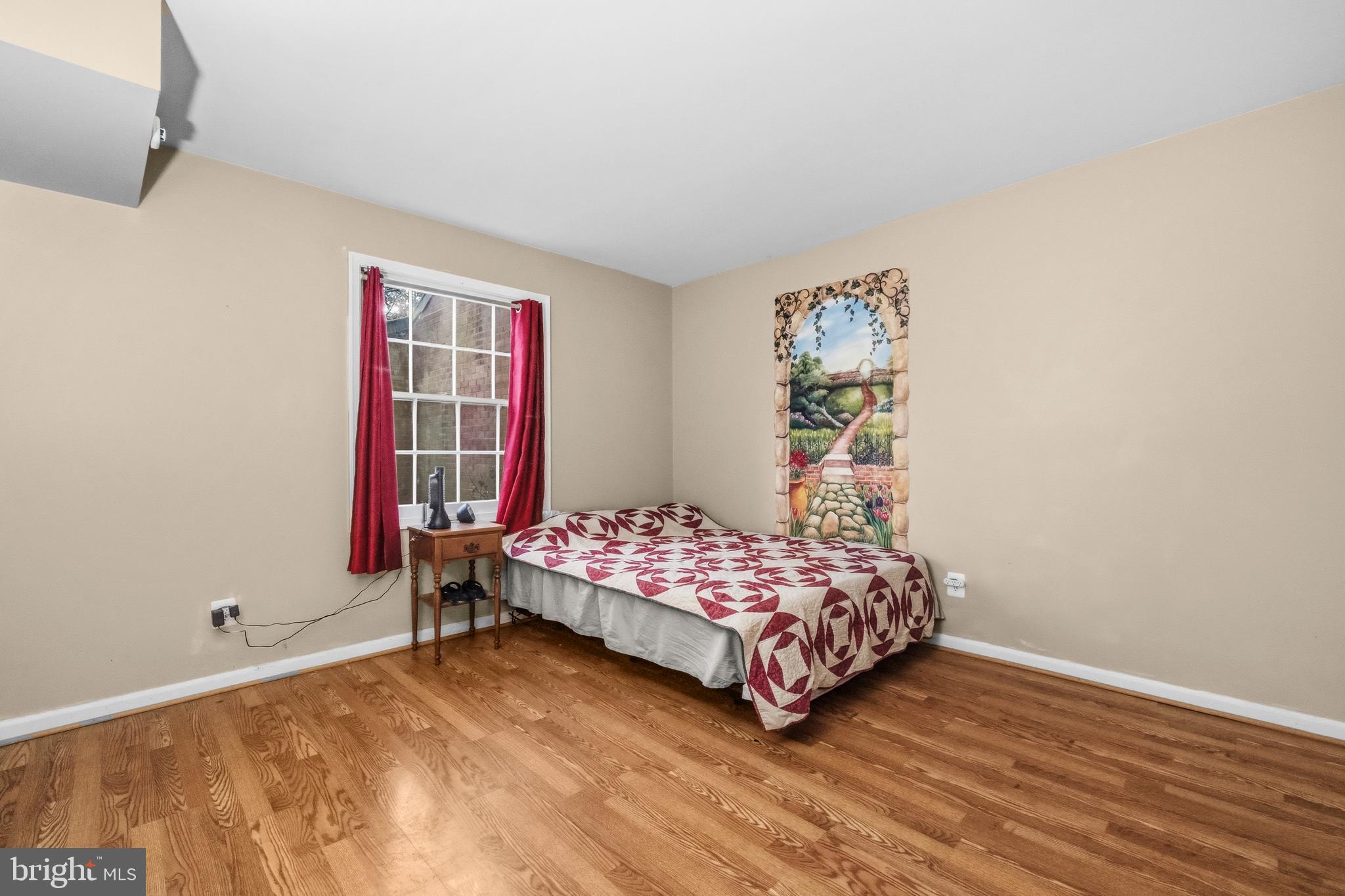 5913 Prince James Drive, Unit J Springfield, VA 22152 - Photo 17 of 33 a bedroom with a bed and a window