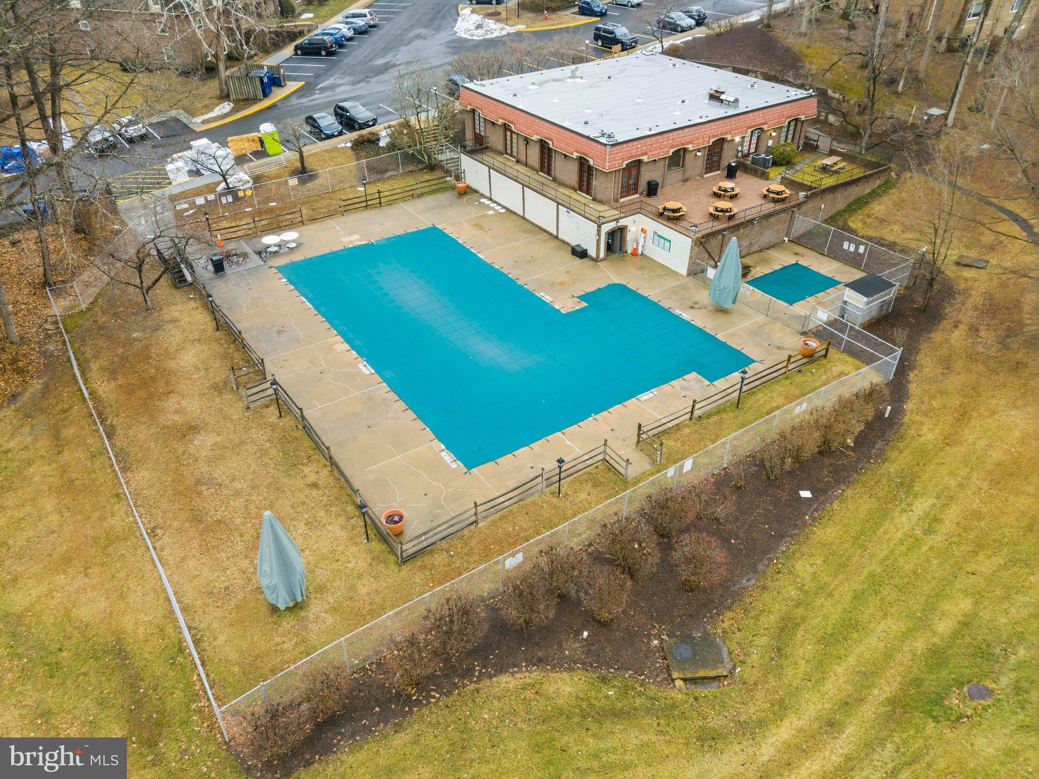 5913 Prince James Drive, Unit J Springfield, VA 22152 - Photo 27 of 33 a aerial view of a house with a swimming pool