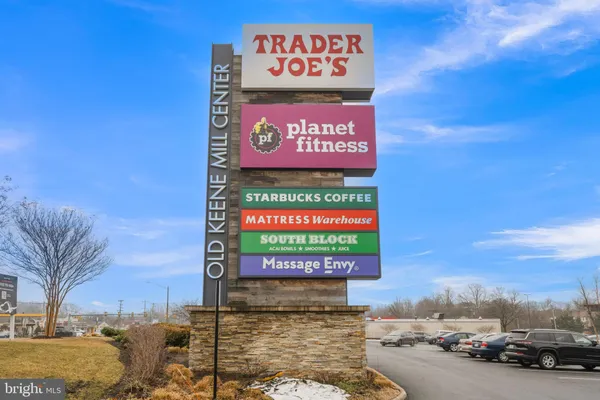 a picture of a bench in a white wall