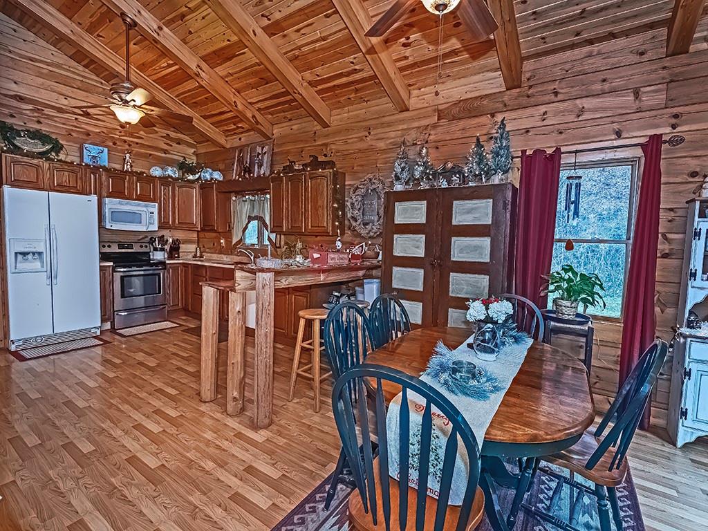 43 Klages Road West Alexander, PA 15376 - Photo 11 of 23 a view of a dining room with furniture window and wooden floor