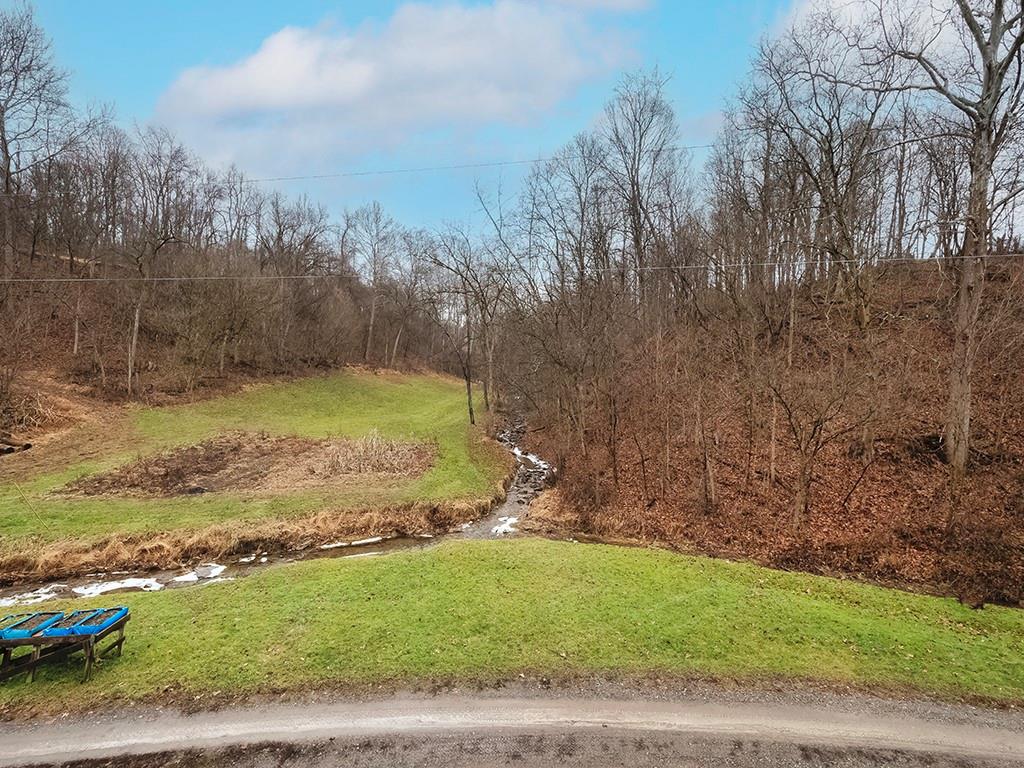 43 Klages Road West Alexander, PA 15376 - Photo 3 of 23 a view of a yard with an trees