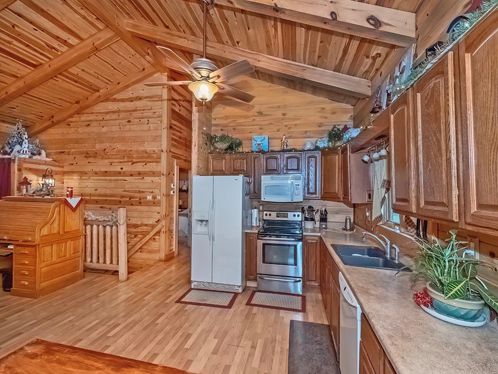 43 Klages Road West Alexander, PA 15376 - Photo 10 of 23 a kitchen with stainless steel appliances granite countertop a stove a sink dishwasher and refrigerator