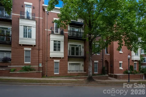 a front view of a building with street view