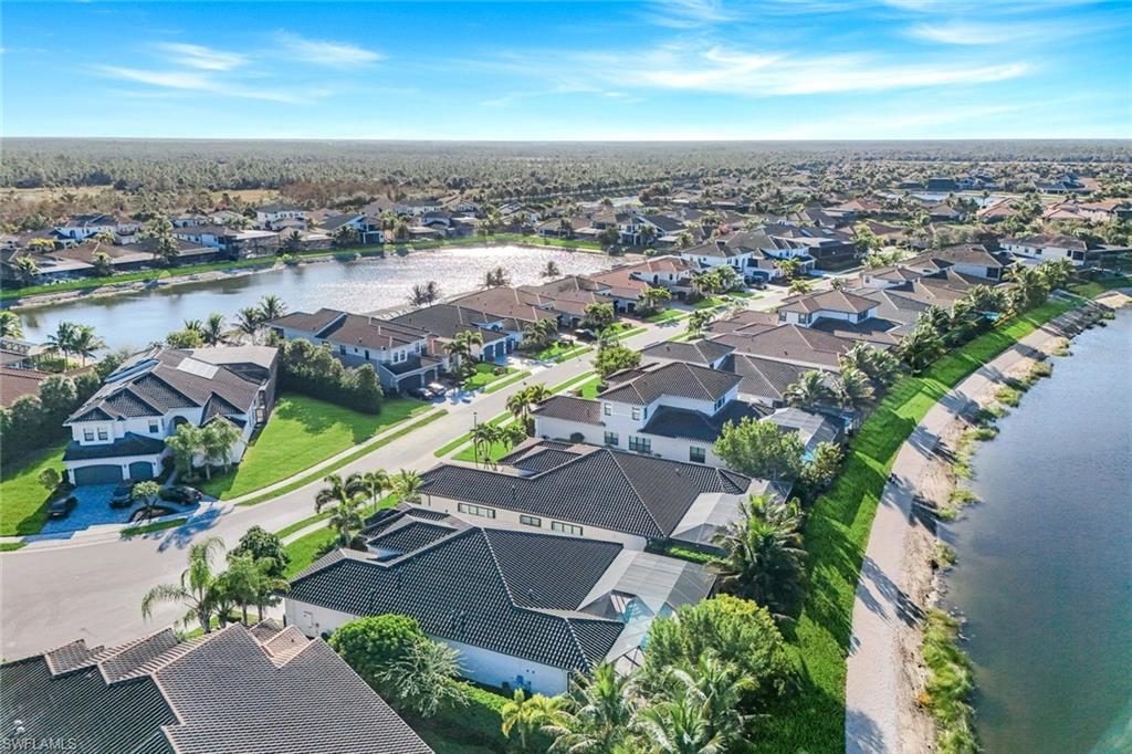4549 Azalea Drive Naples, FL 34119 - Photo 44 of 49 an aerial view of city and lake