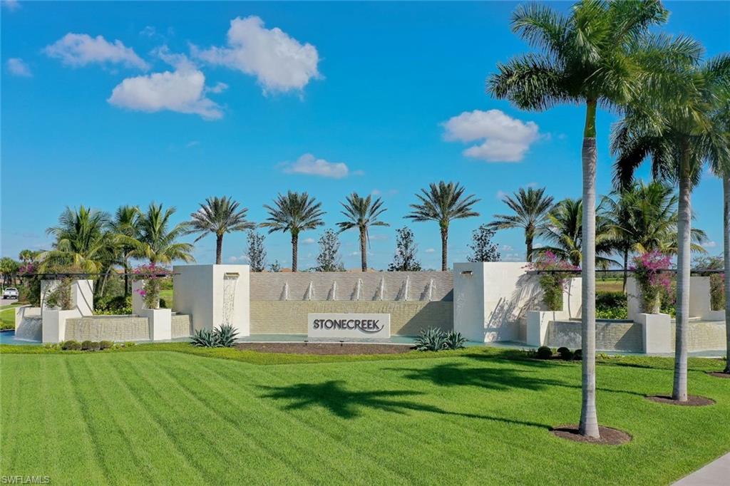 4549 Azalea Drive Naples, FL 34119 - Photo 45 of 49 a view of a park with a palm trees