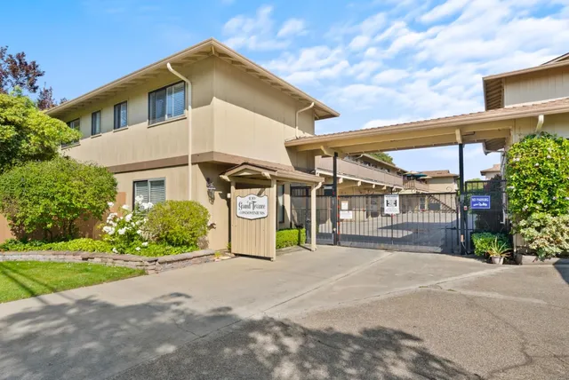 a view of a house with a street