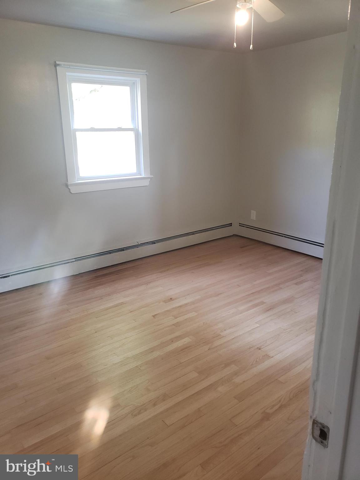 220 Franklin Road Glassboro, NJ 08028 - Photo 23 of 40 a view of an empty room with a window