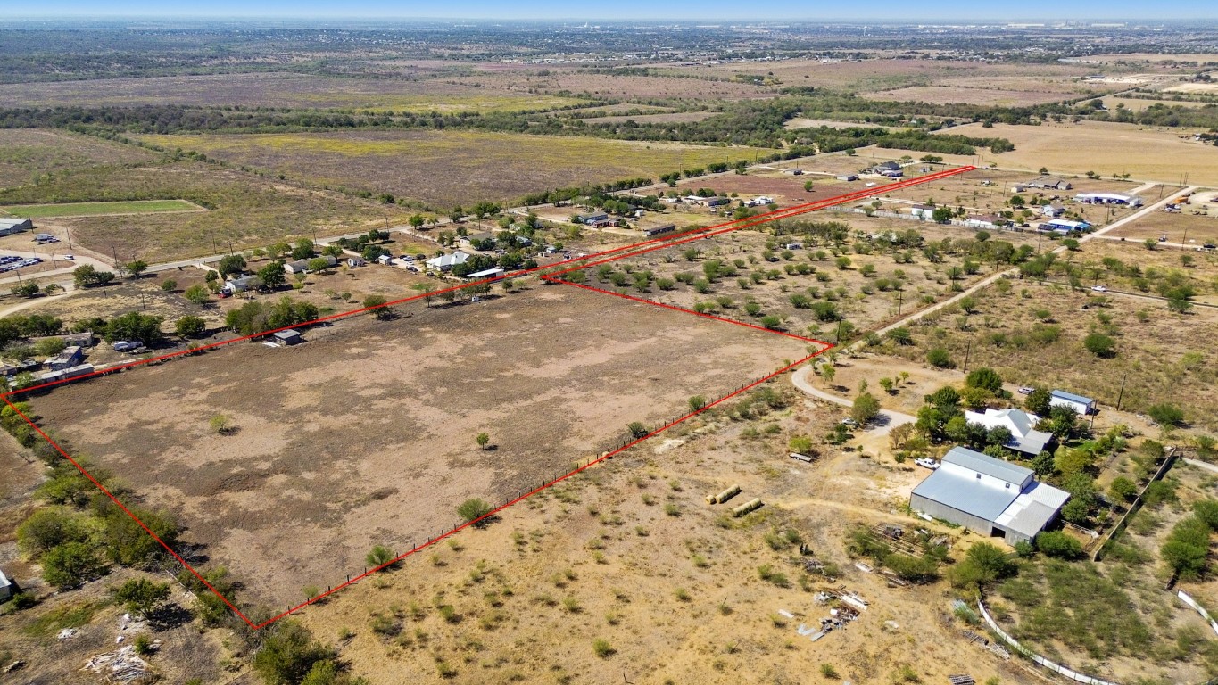 an aerial view of ocean with residential house and lake view