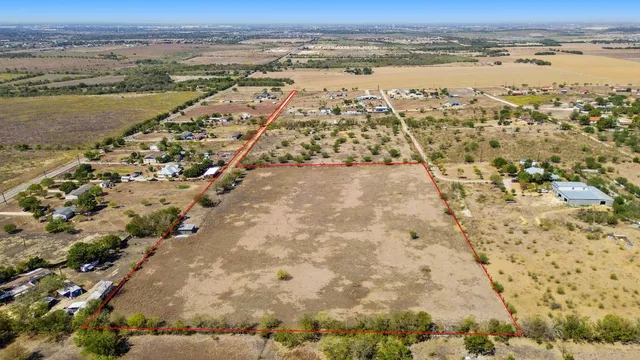 an aerial view of beach and ocean