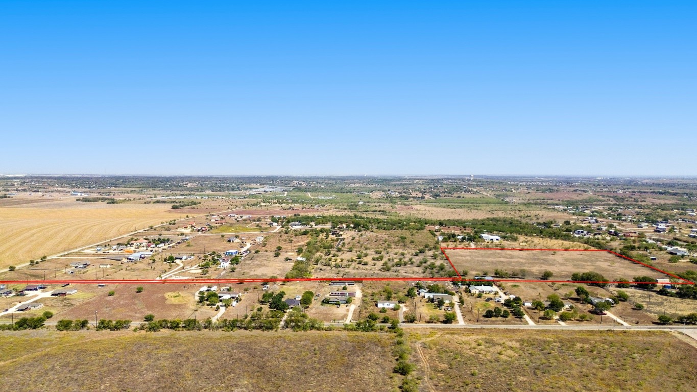 1513 Graef Road Kyle, TX 78640 - Photo 5 of 13 an aerial view of ocean and residential houses with outdoor space
