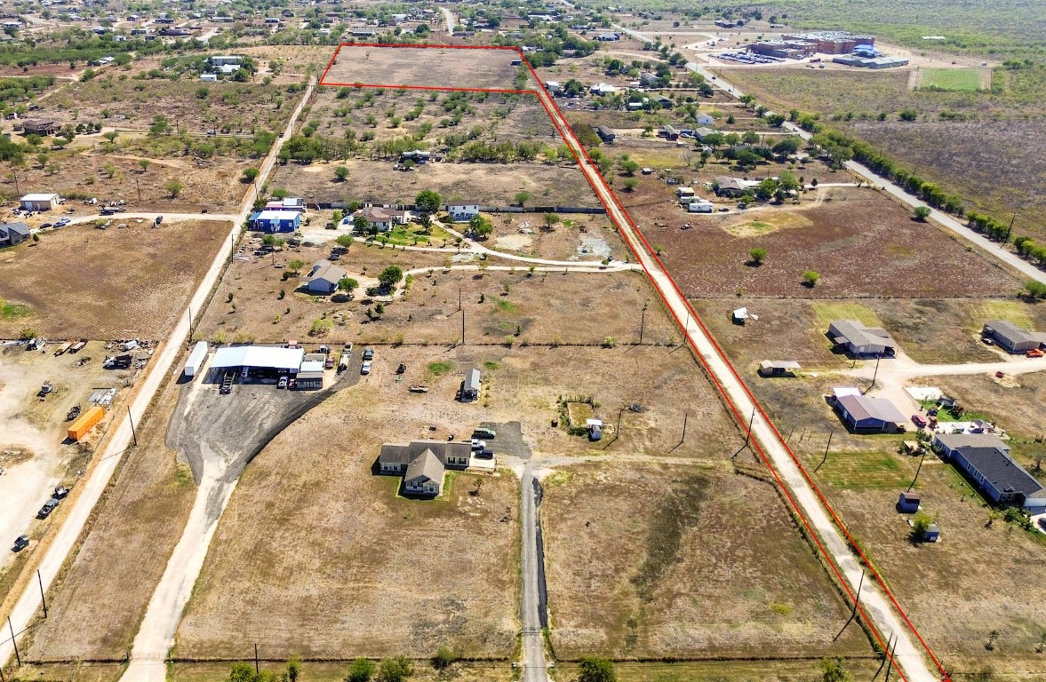 1513 Graef Road Kyle, TX 78640 - Photo 6 of 13 an aerial view of residential houses with outdoor space