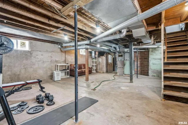 a view of a porch with furniture and a ceiling fan