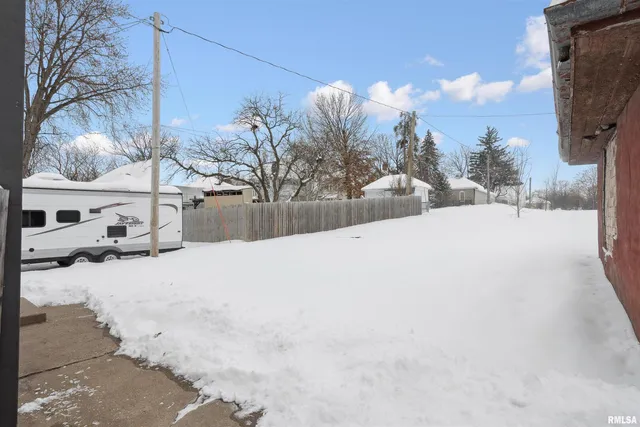 a view of a snow on the road