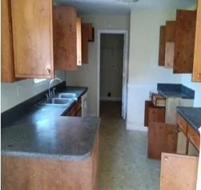a view of a living room and dining room