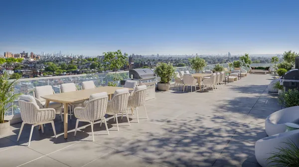 a view of a terrace with sitting area