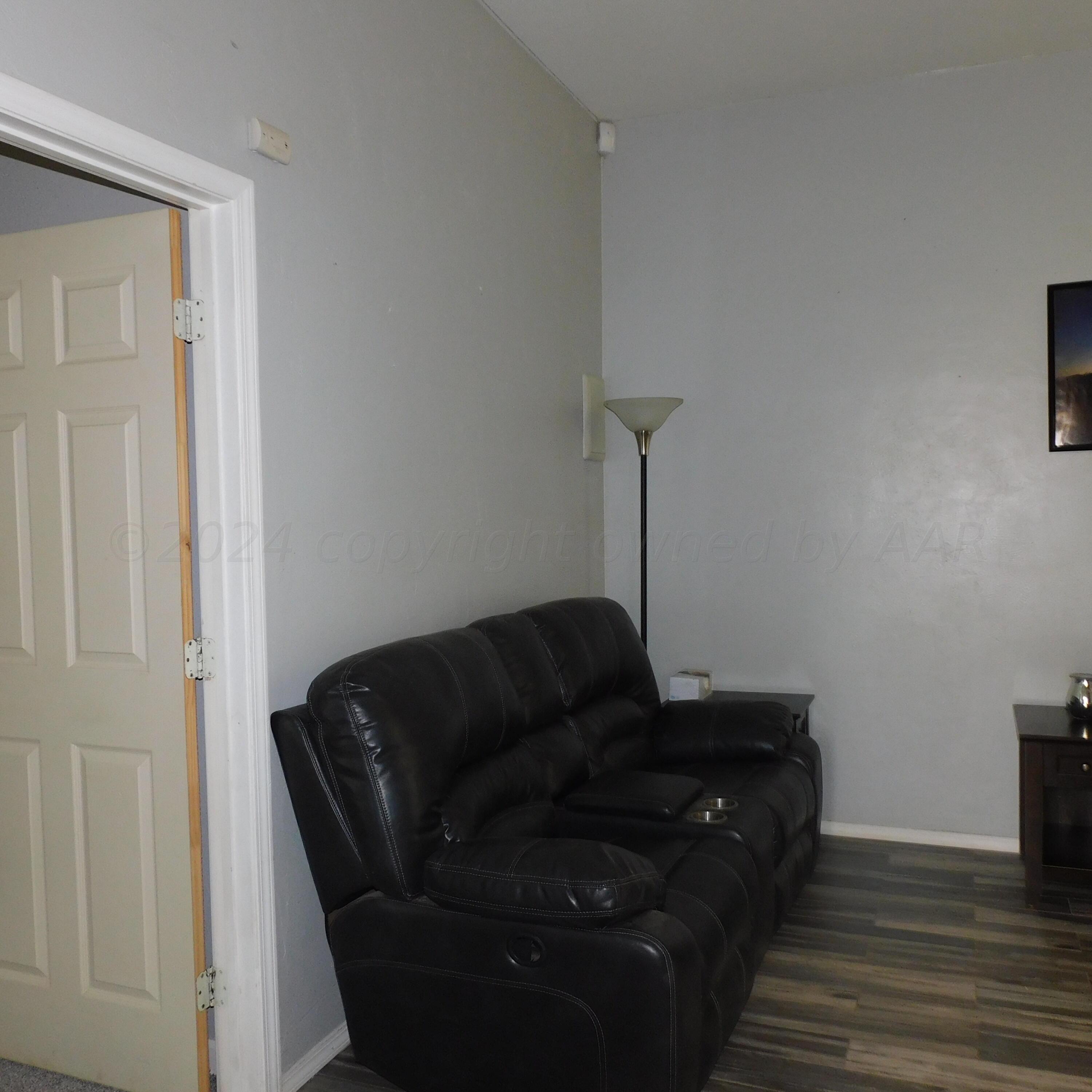 2201 Troveta Drive Amarillo, TX 79110 - Photo 22 of 33 a living room with furniture