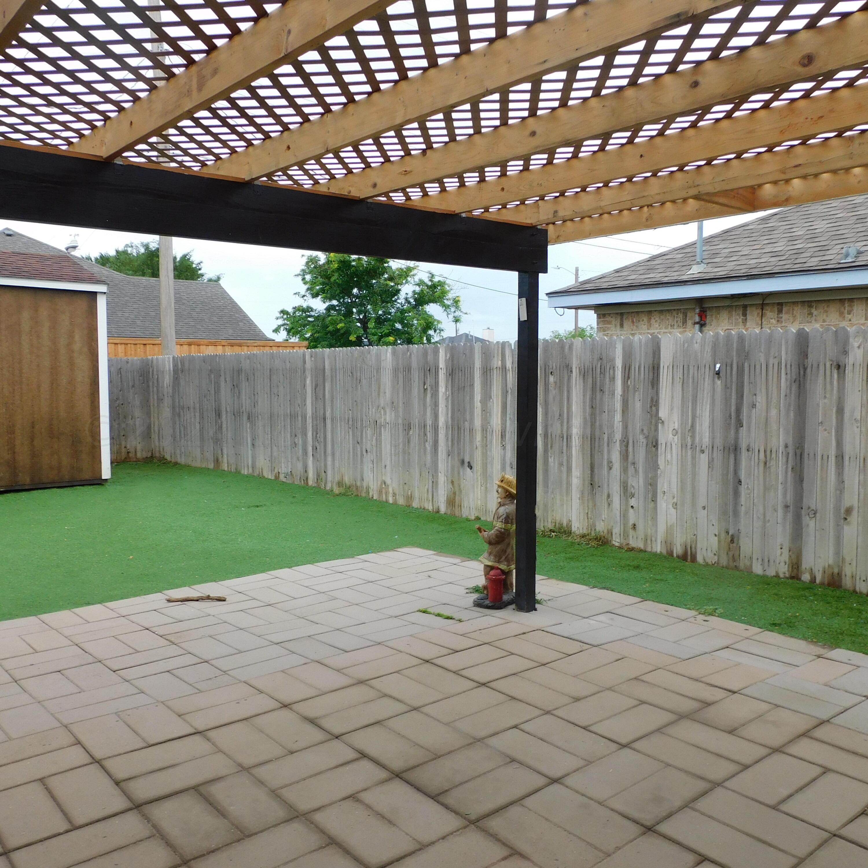 2201 Troveta Drive Amarillo, TX 79110 - Photo 29 of 33 a view of backyard with wooden fence