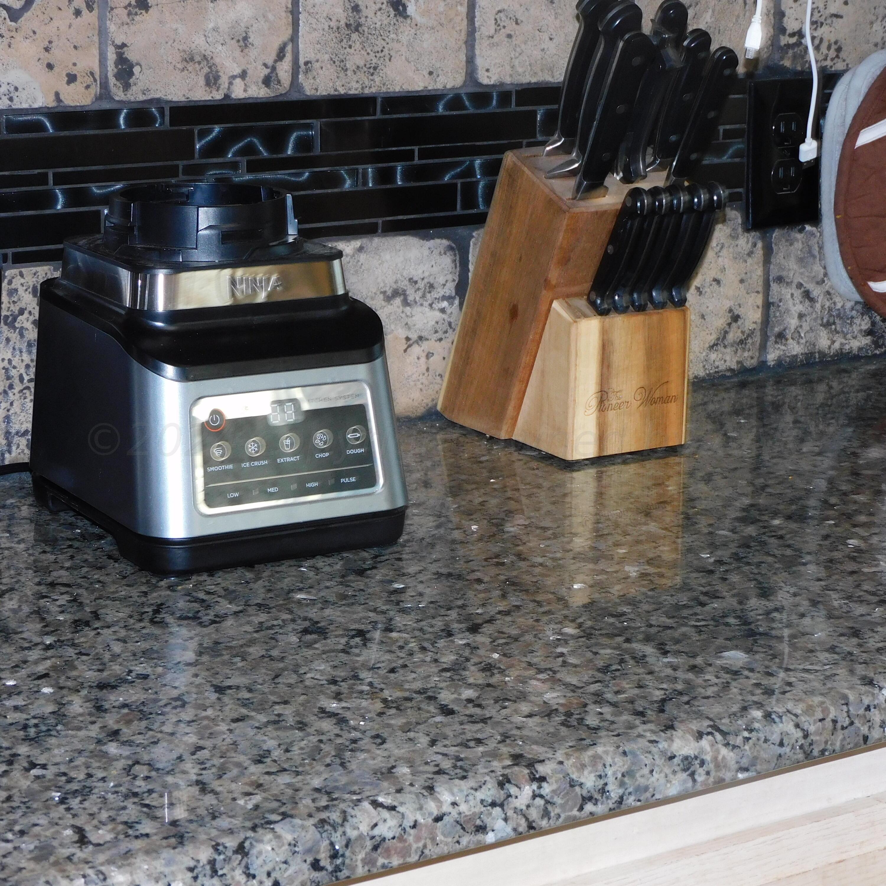 2201 Troveta Drive Amarillo, TX 79110 - Photo 7 of 33 a stove top oven sitting inside of a kitchen