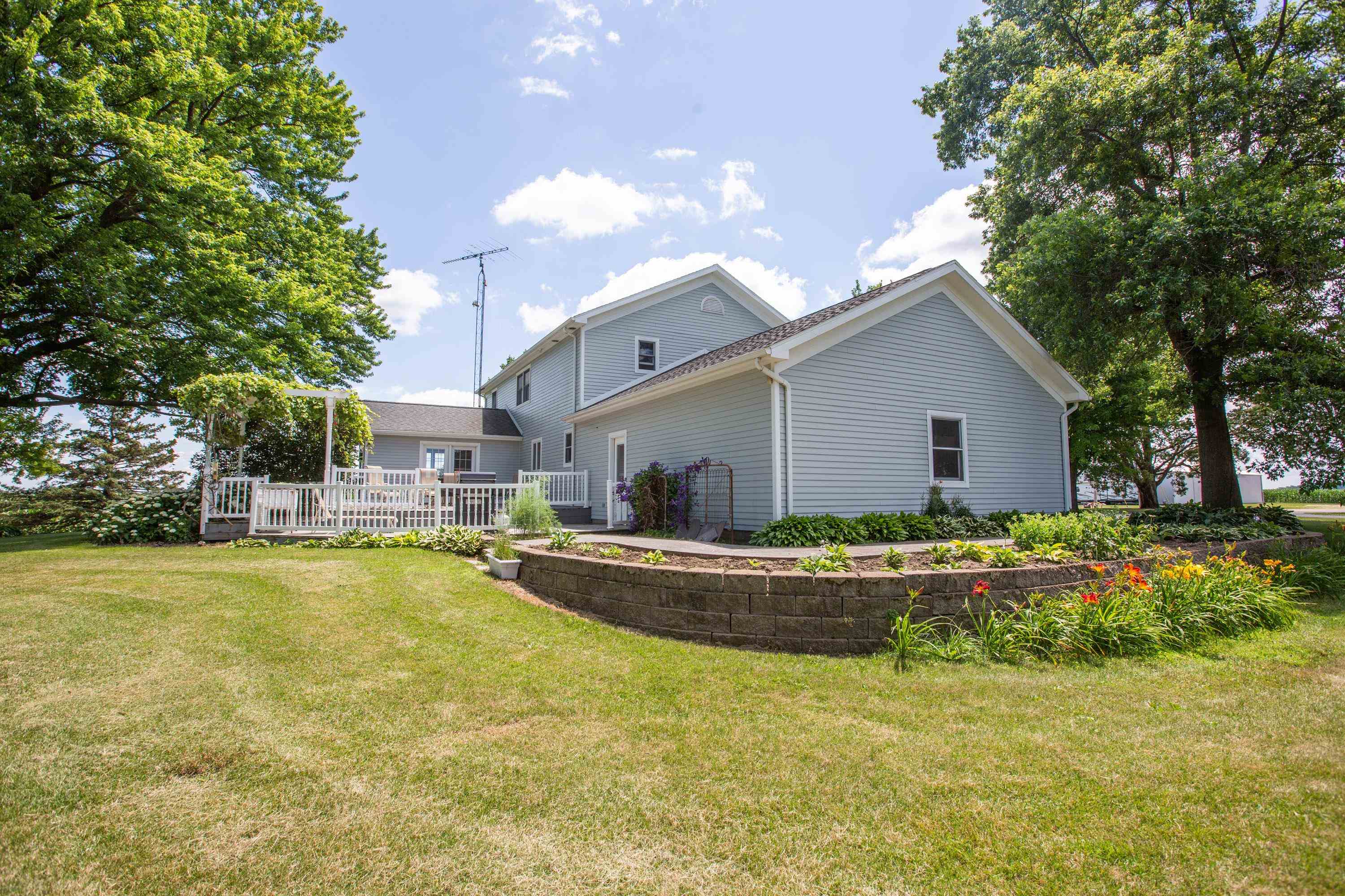 17092 Blackhawk Road Shullsburg, WI 53586 - Photo 44 of 50 a front view of house with swimming pool and yard