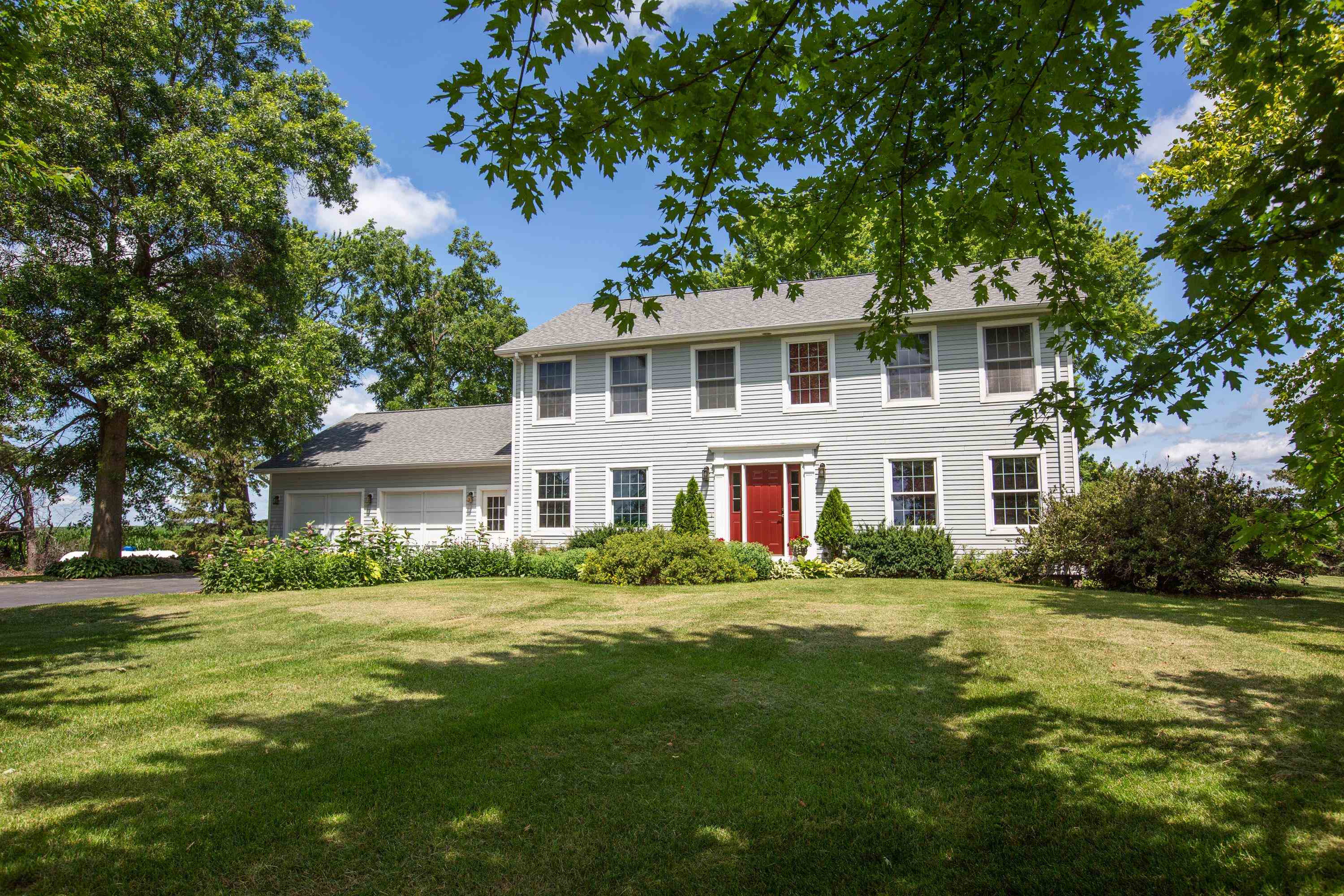 17092 Blackhawk Road Shullsburg, WI 53586 - Photo 50 of 50 a front view of a house with a garden