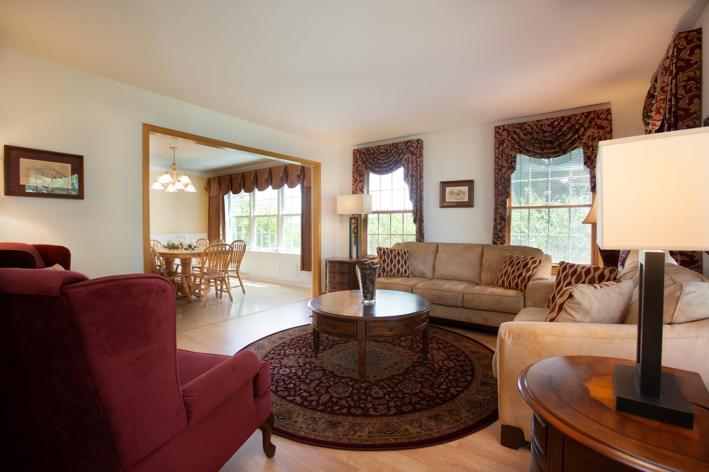 17092 Blackhawk Road Shullsburg, WI 53586 - Photo 9 of 50 a living room with furniture a rug a lamp and a large window