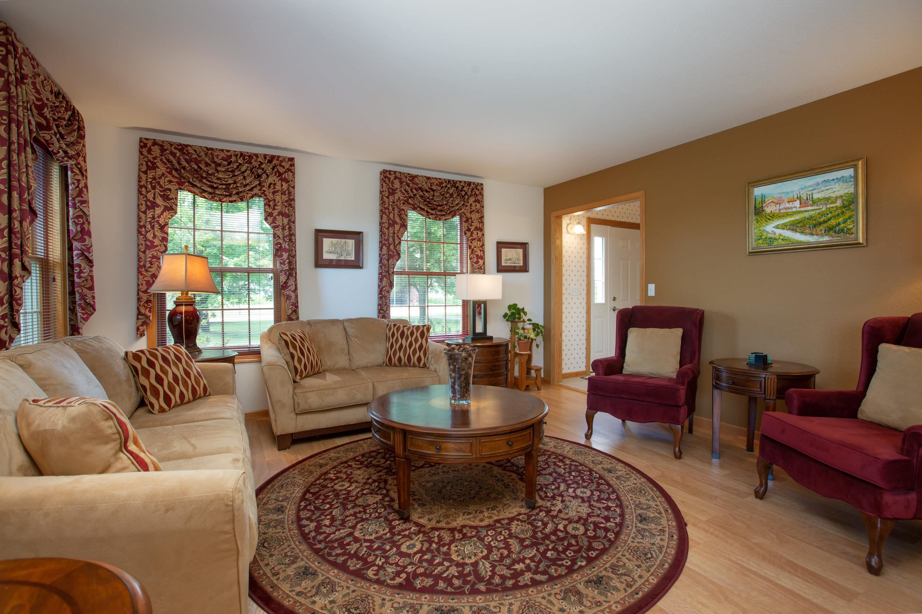 17092 Blackhawk Road Shullsburg, WI 53586 - Photo 10 of 50 a living room with furniture a lamp and a rug