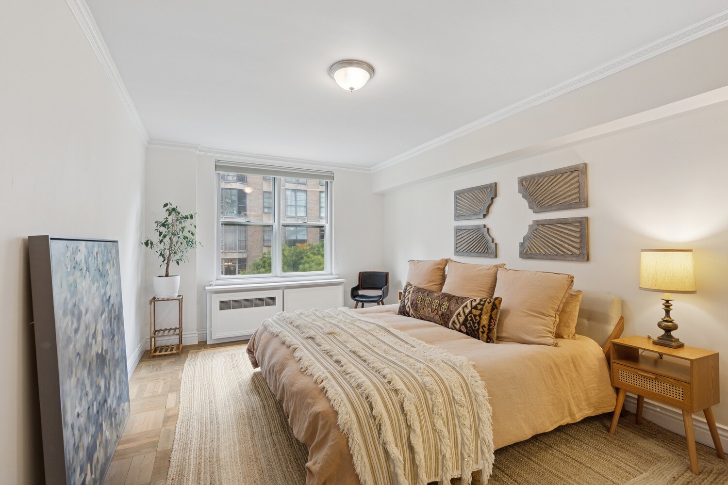 13 West 13th Street, Unit 7FS Manhattan, NY 10011 - Photo 5 of 11 a bedroom with a bed and a window