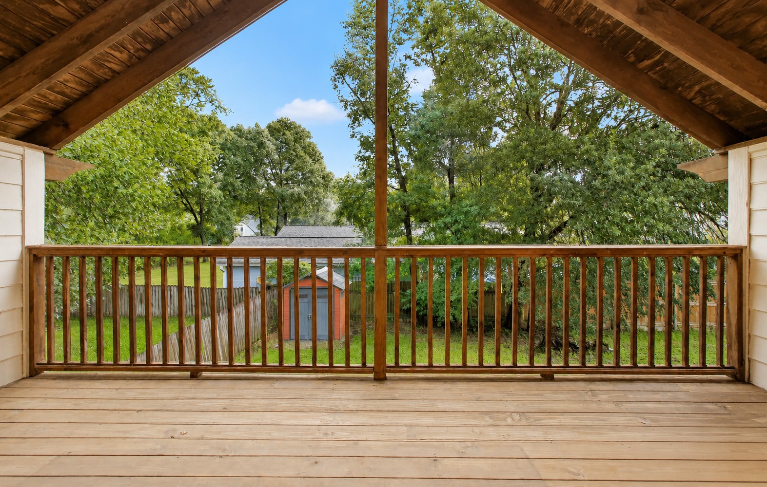 312 Springwood Drive Conroe, TX 77385 - Photo 32 of 50 The private covered balcony provides a quiet place to enjoy your morning coffee or a private yoga session while taking in the scenic views.