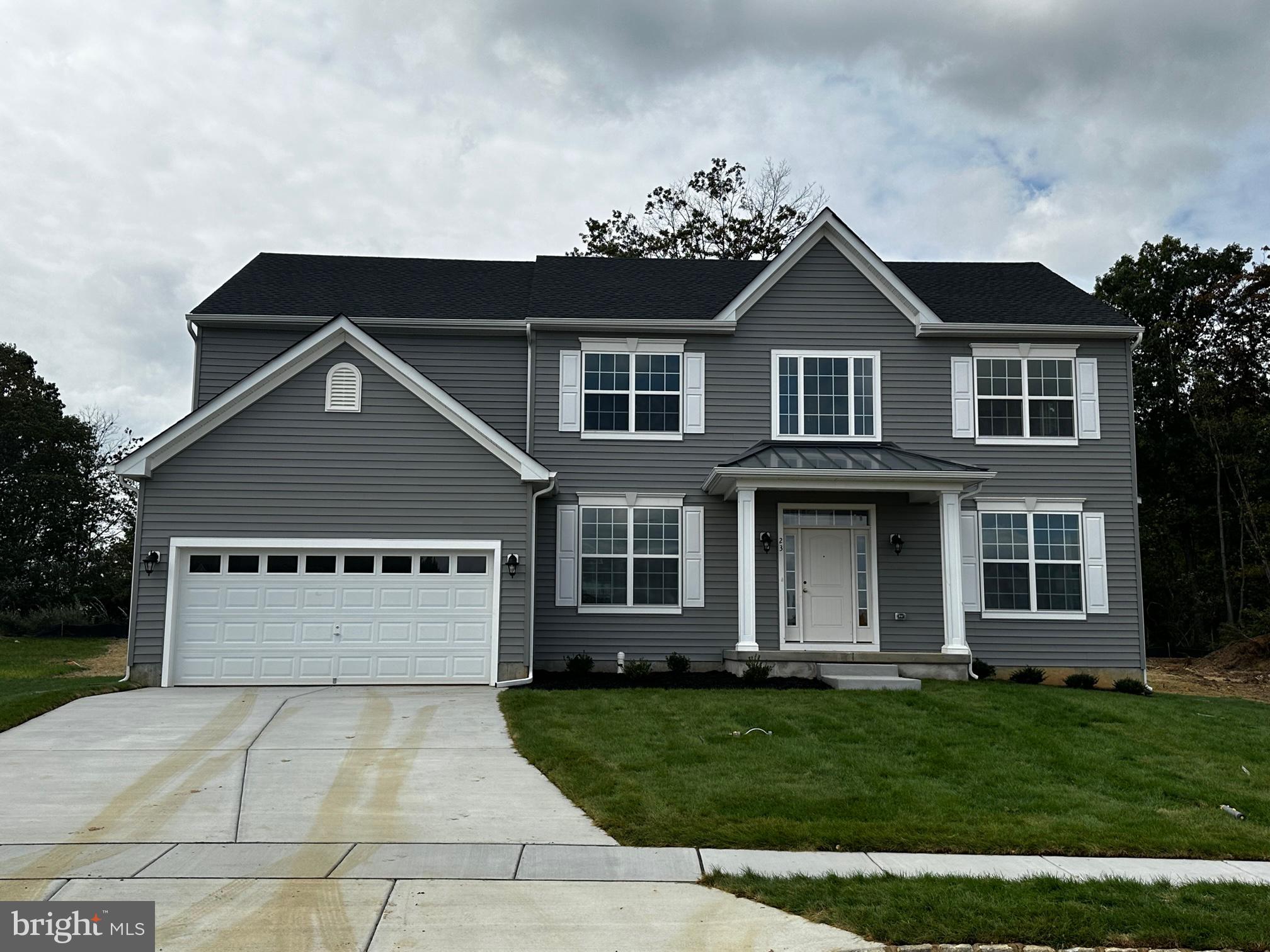 20 Champlain Road Marlton, NJ 08053 - Photo 15 of 15 a front view of a house with a yard and garage