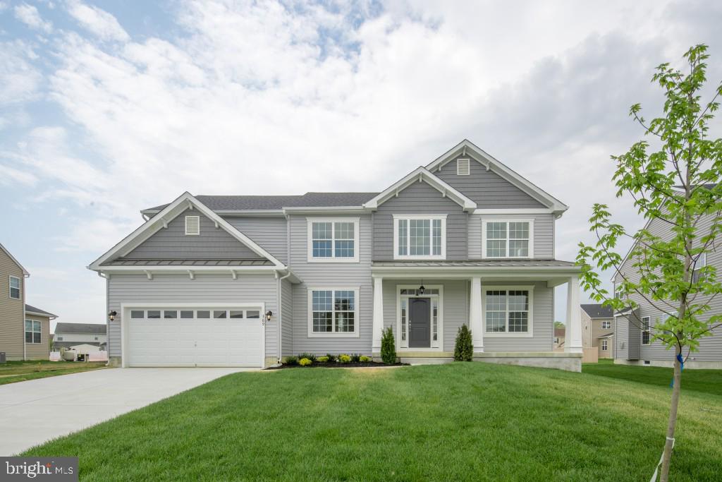20 Champlain Road Marlton, NJ 08053 - Photo 2 of 15 a front view of a house with a garden