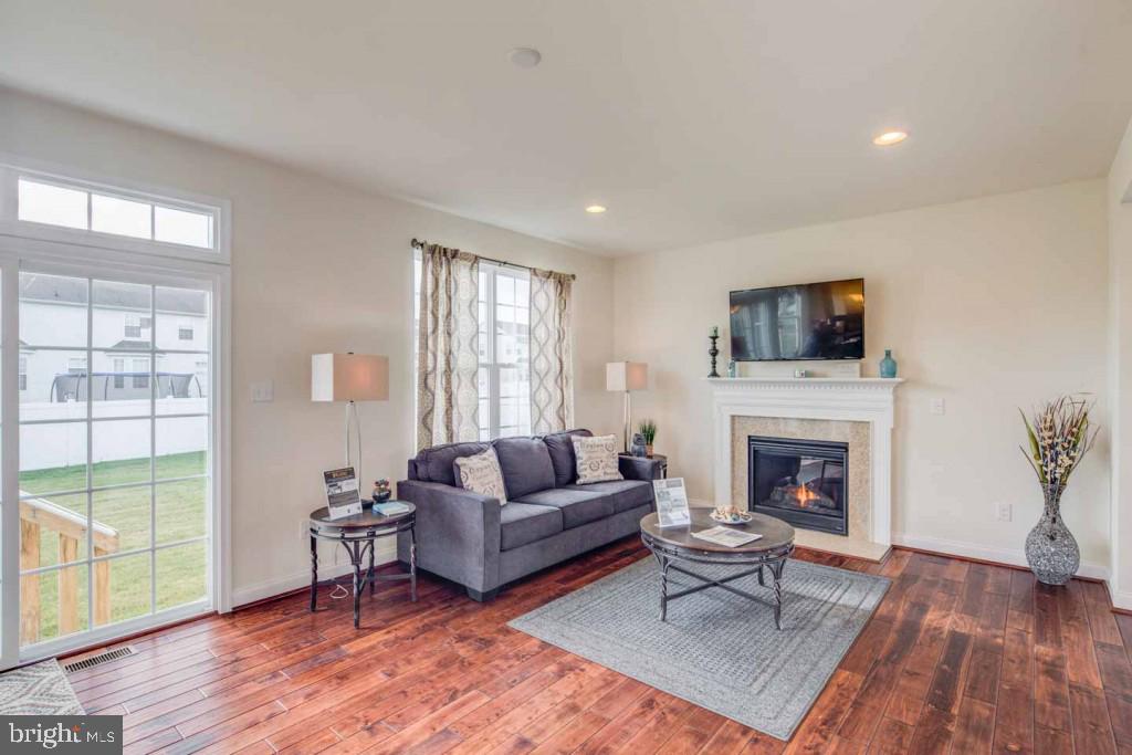 20 Champlain Road Marlton, NJ 08053 - Photo 4 of 15 a living room with furniture and a fireplace