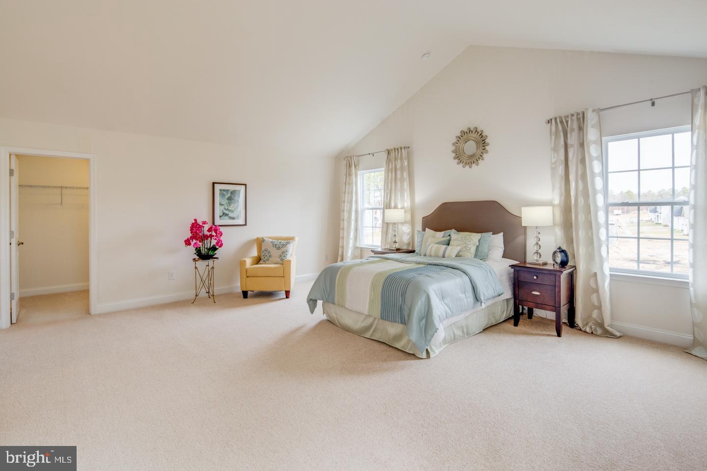 20 Champlain Road Marlton, NJ 08053 - Photo 8 of 15 a spacious bedroom with a bed and a window