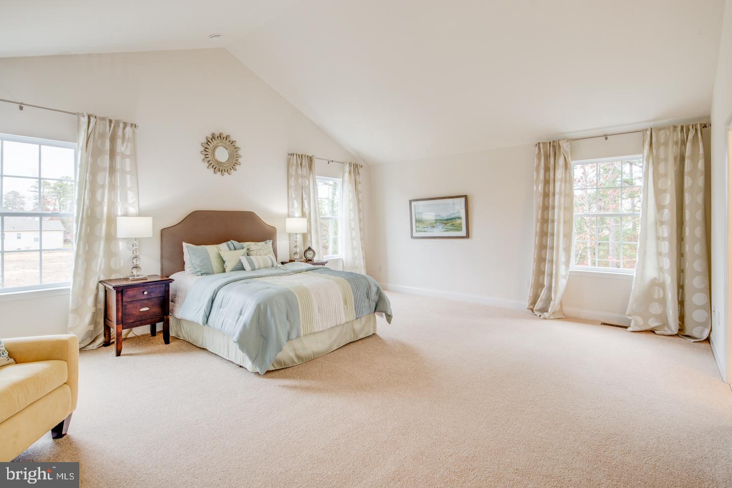 20 Champlain Road Marlton, NJ 08053 - Photo 10 of 15 a bedroom with a bed couch and a window