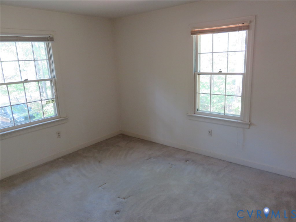 8379 Quailfield Road Mechanicsville, VA 23116 - Photo 36 of 56 an empty room with a window