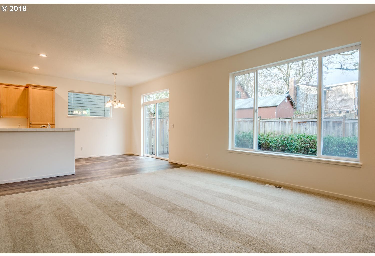 20591 Southwest Ravenswood Street Beaverton, OR 97078 - Photo 20 of 31 an empty room with a empty space and windows