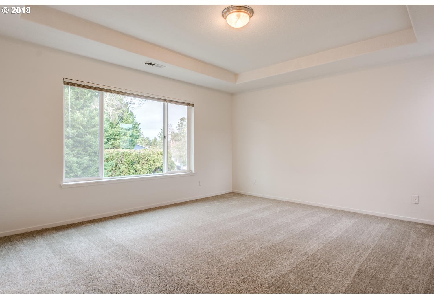 20591 Southwest Ravenswood Street Beaverton, OR 97078 - Photo 23 of 31 an empty room with windows