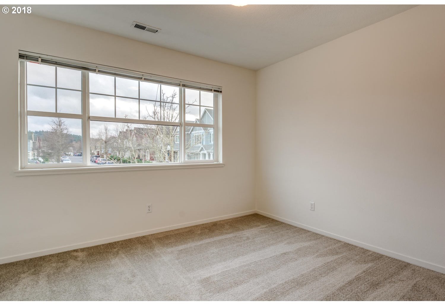 20591 Southwest Ravenswood Street Beaverton, OR 97078 - Photo 28 of 31 an empty room with a window