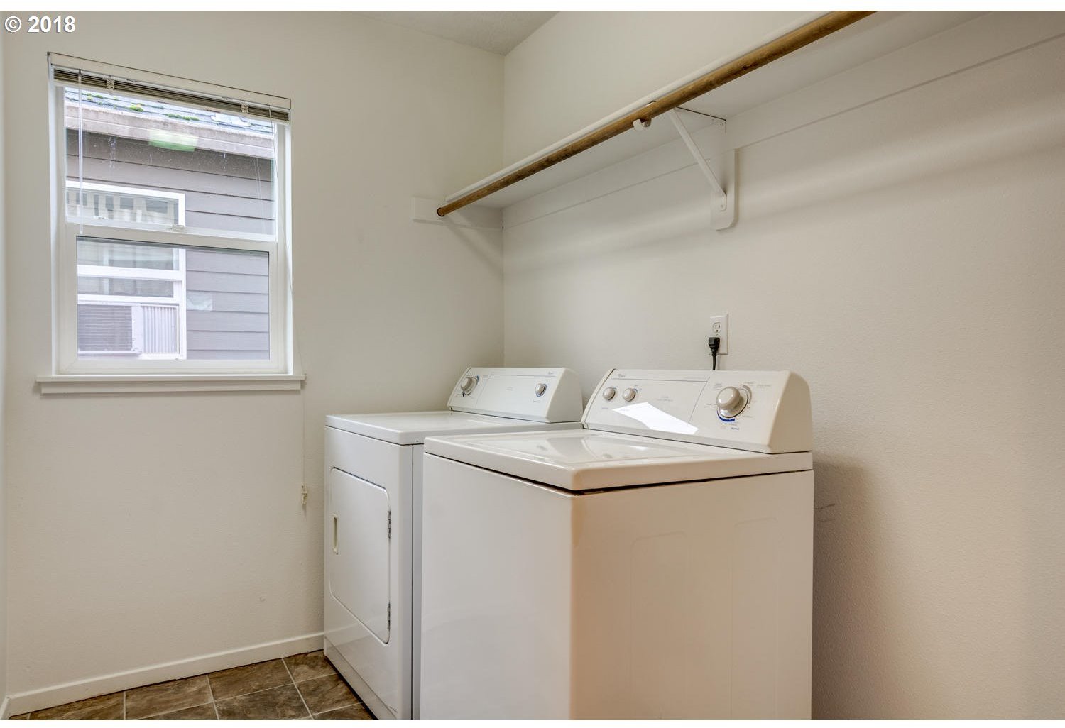 20591 Southwest Ravenswood Street Beaverton, OR 97078 - Photo 30 of 31 a utility room with dryer and washer