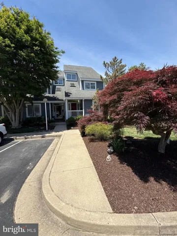 a view of a house with a garden
