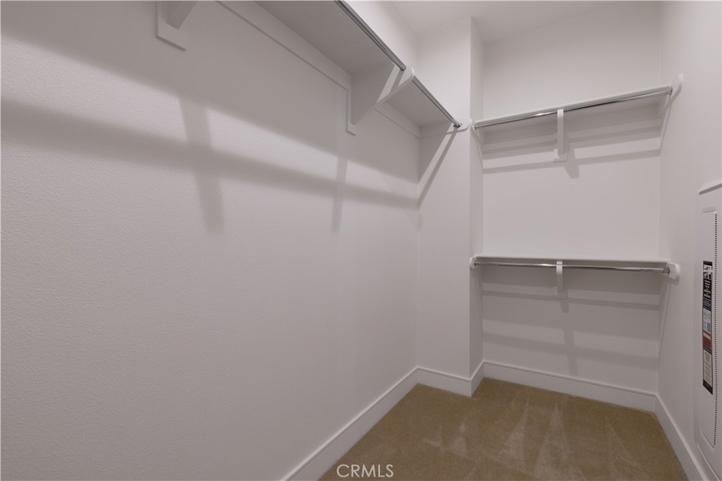 113 Halworth Irvine, CA 92618 - Photo 22 of 30 a view of an empty walk in closet