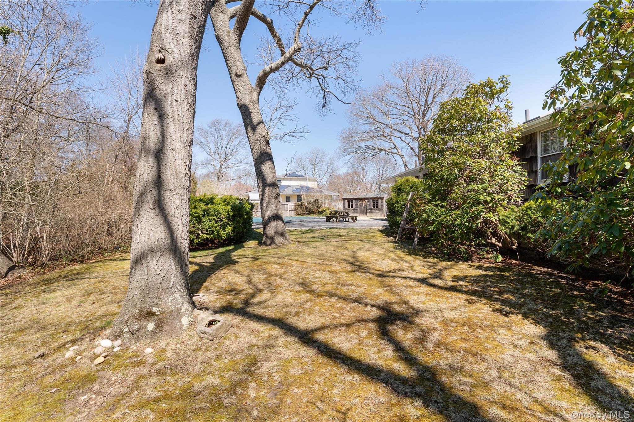 52 Woodbury Road Farmingville, NY 11738 - Photo 23 of 25 Private fenced yard with mature landscape