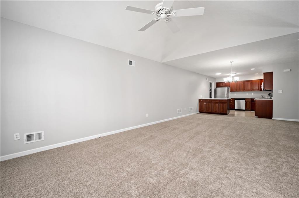 179 Rana Lane Gibsonia, PA 15044 - Photo 15 of 25 a view of a livingroom with furniture and a chandelier fan