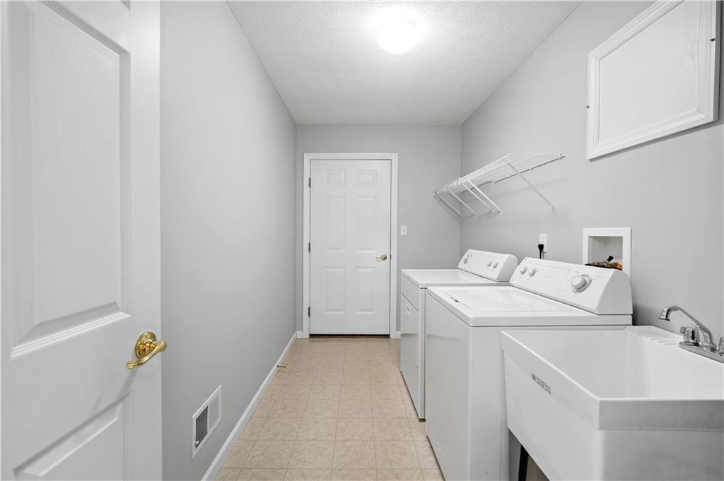 179 Rana Lane Gibsonia, PA 15044 - Photo 16 of 25 a utility room with dryer and washer