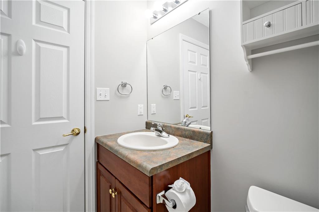 179 Rana Lane Gibsonia, PA 15044 - Photo 23 of 25 a bathroom with a sink and a mirror