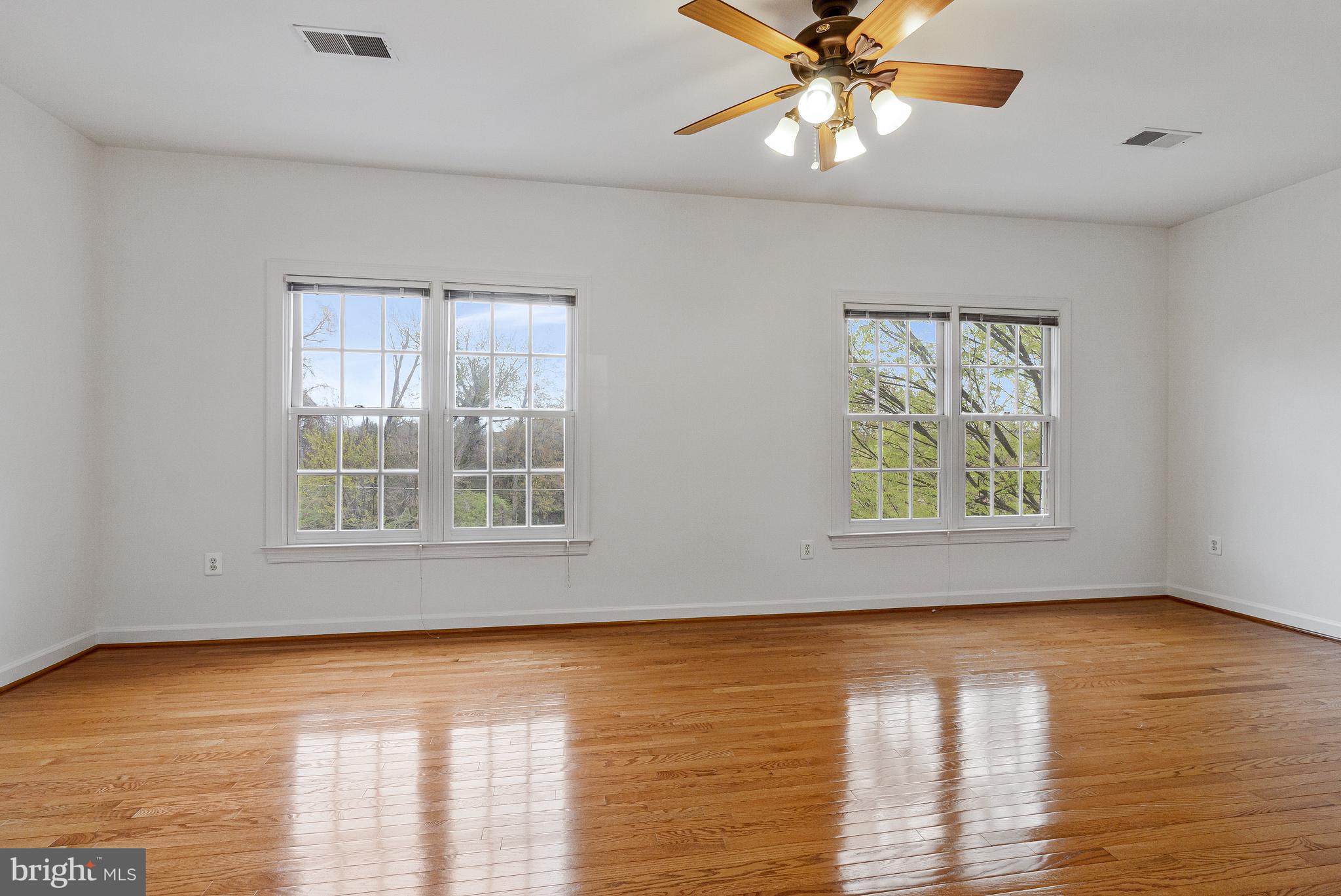 1646 Colonial Hills Drive McLean, VA 22102 - Photo 18 of 39 a view of an empty room with window and wooden floor